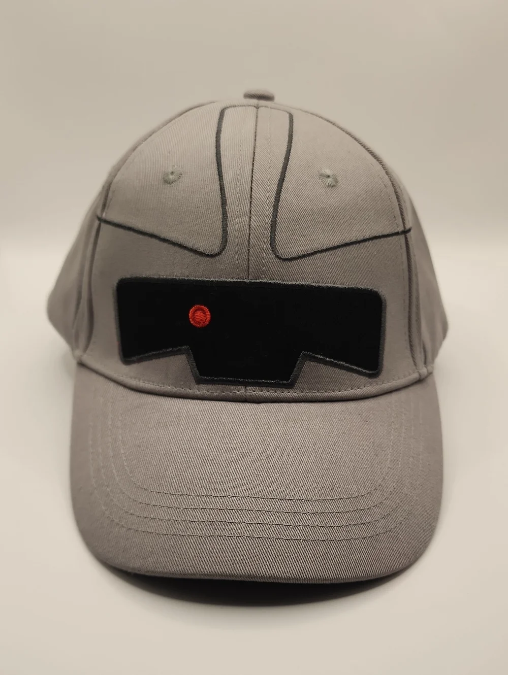 Gray Baseball Cap with Black Patch and Red Accent